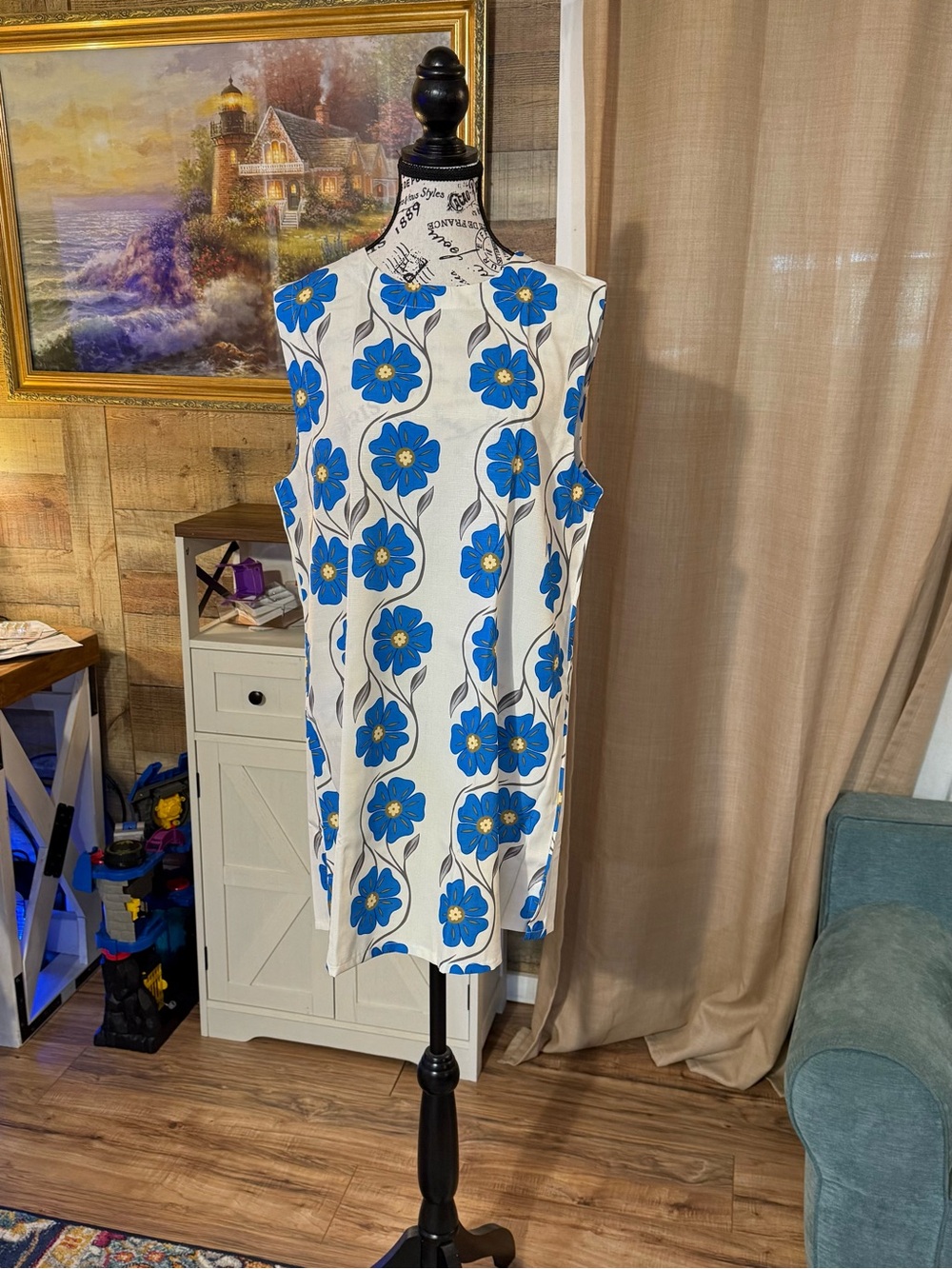 Sleeveless White Mini Dress with Bright Blue Floral Print
